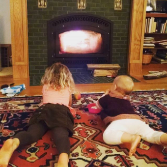 kids by the fireplace